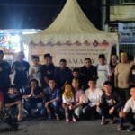 Corolla Retro Makassar Bagikan Ratusan Paket Takjil ke Pengguna Jalan dan Buka Puasa Bersama Anak Yatim